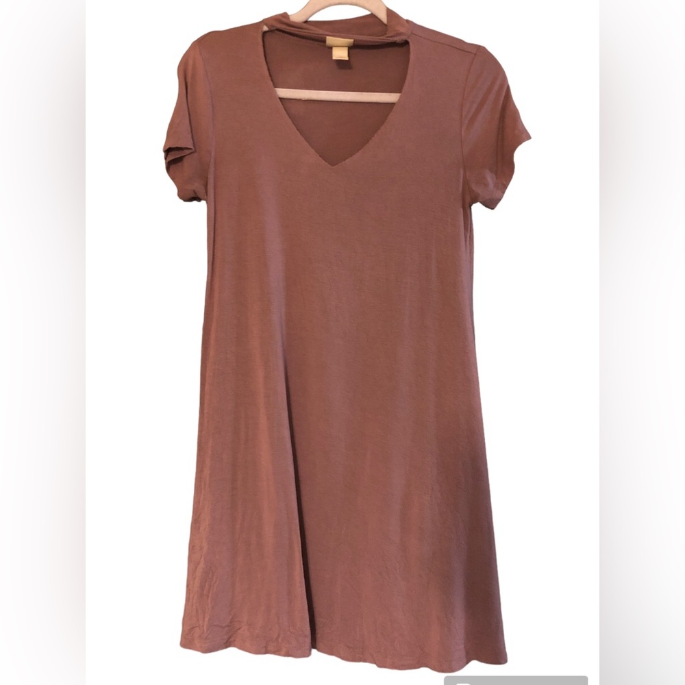 Cute cotton dress with interesting neck line. Could be work as a tunic.